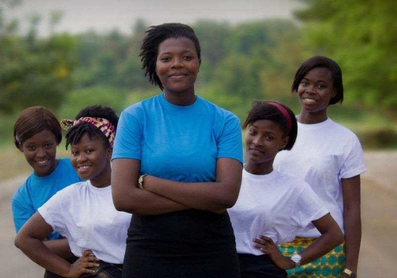 Corporate team members in clean blue and white shirts
